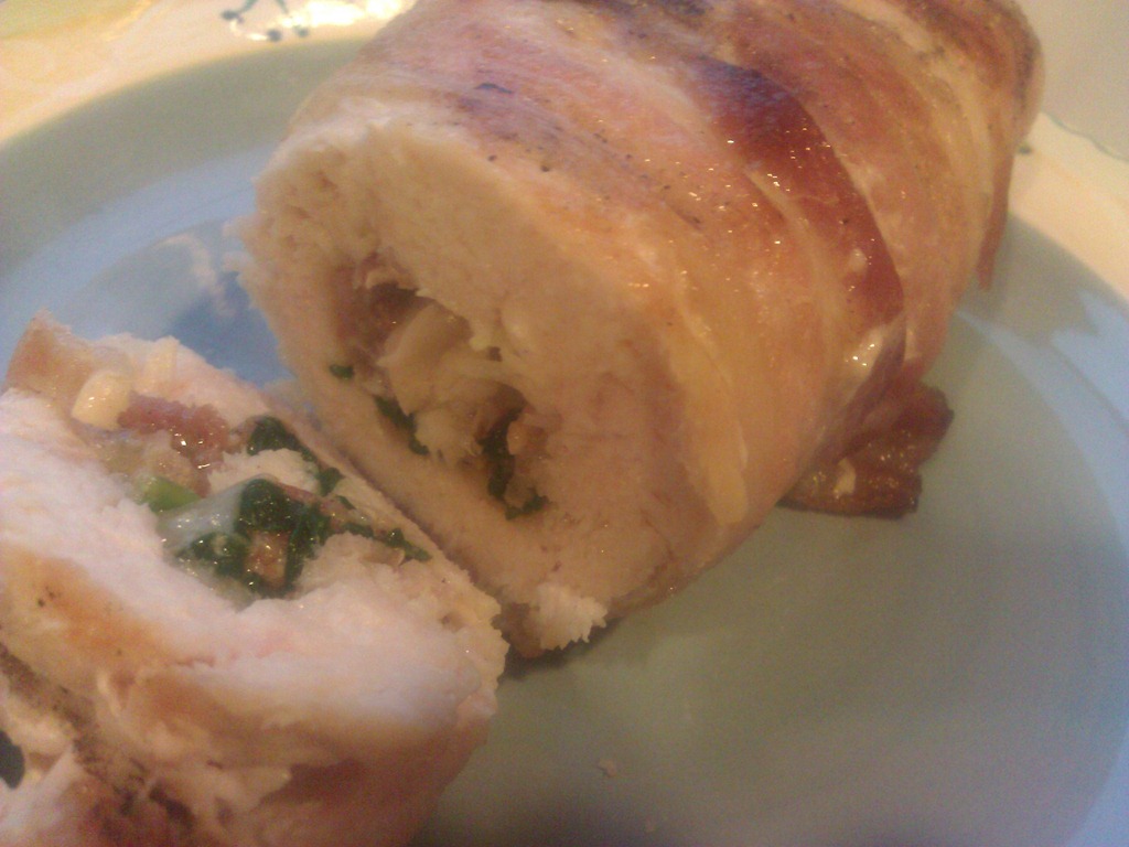 Spinach stuffed chicken wrapped in bacon